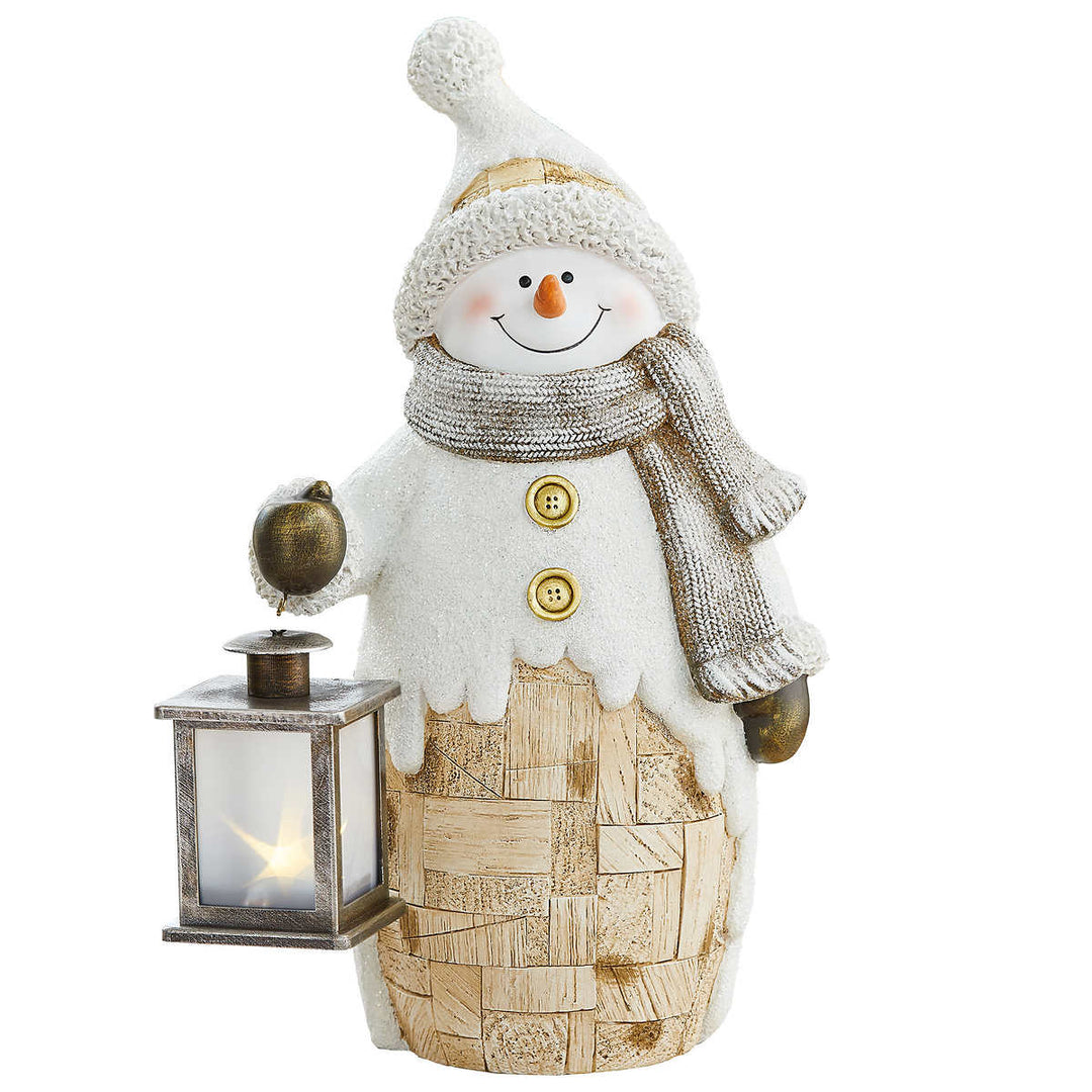 Figurines en copeaux de bois avec lanterne