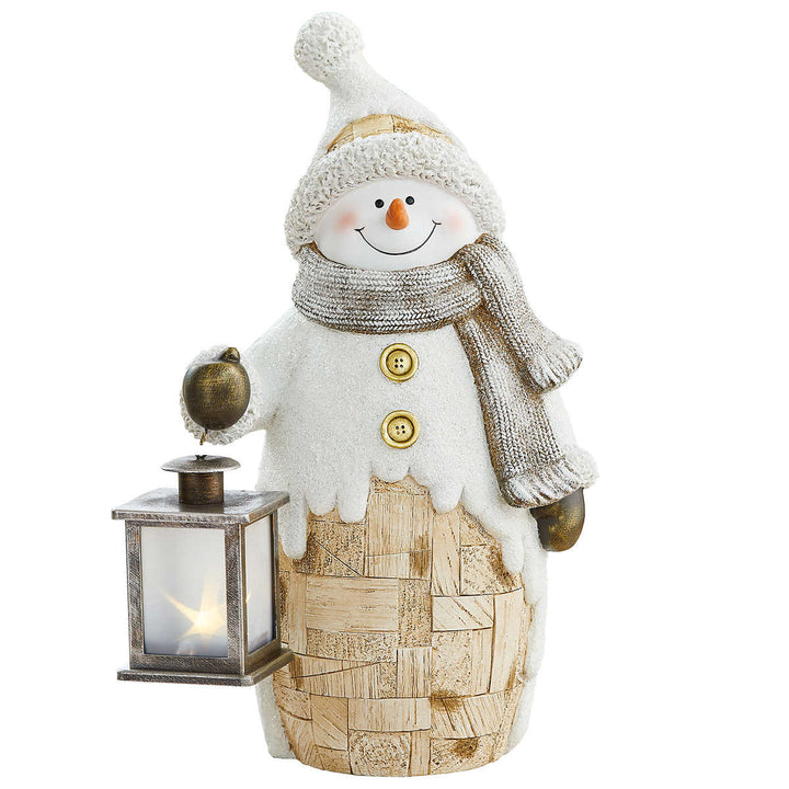Figurines en copeaux de bois avec lanterne
