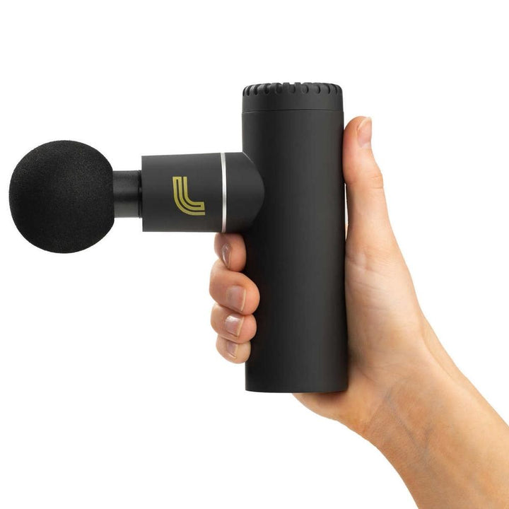 Lolë Percussion Massage Device with 4 Interchangeable Massage Heads