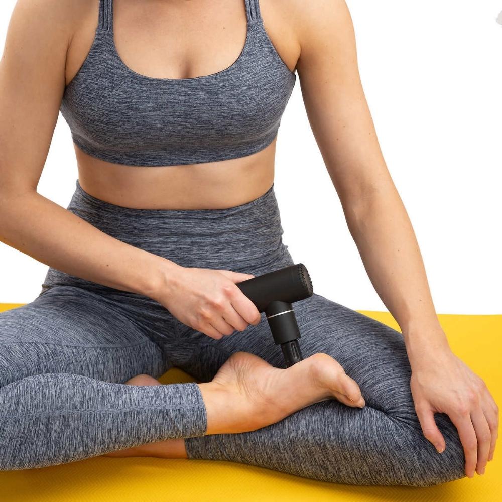 Lolë Percussion Massage Device with 4 Interchangeable Massage Heads