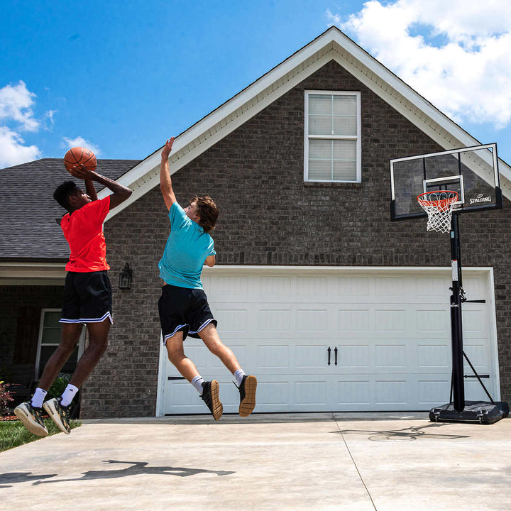 Spalding - Système de basketball portatif en polycarbonate Accuglide de 54 po